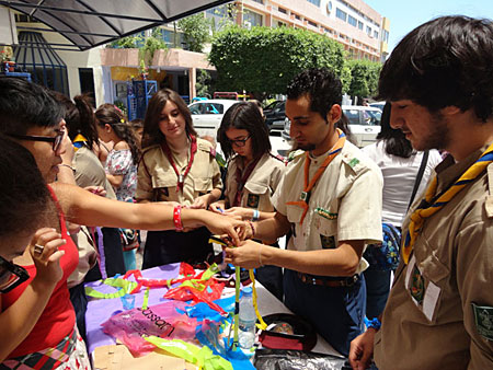 Armenian scouts participating in the “DOBRAG” Project prepare decorative items reusing plastic bags.